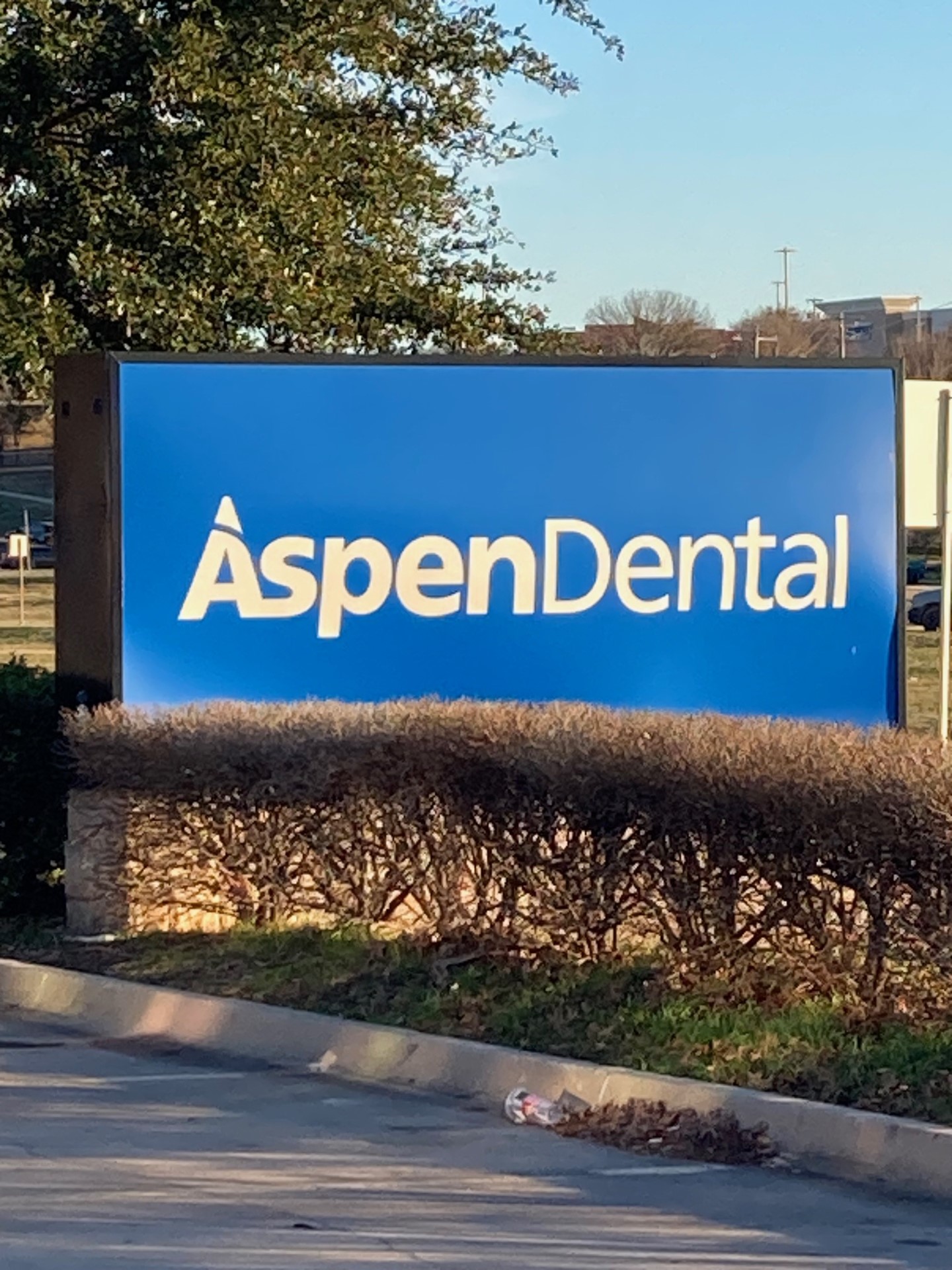 aspen dental sign Familiar Aspen Dental sign in front of a location.